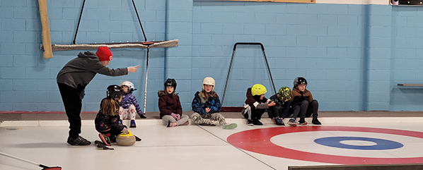Programs introduce kids to curling, hockey